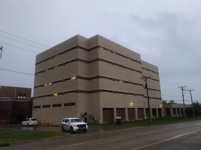 An imposing jail building that is also used for immigration detention